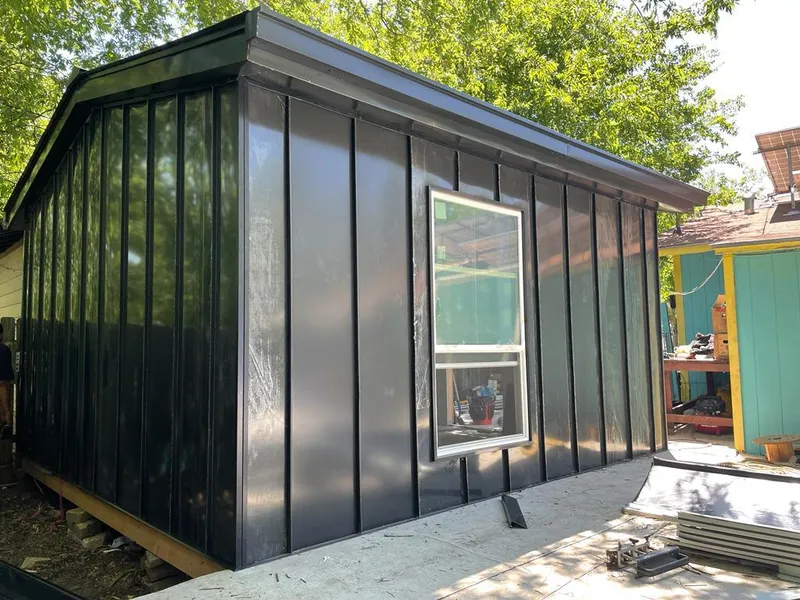 Black standing seam metal wall panels for Roof Inspection in Marshfield